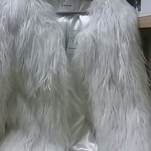 L faux fur white coat new never worn or tried on